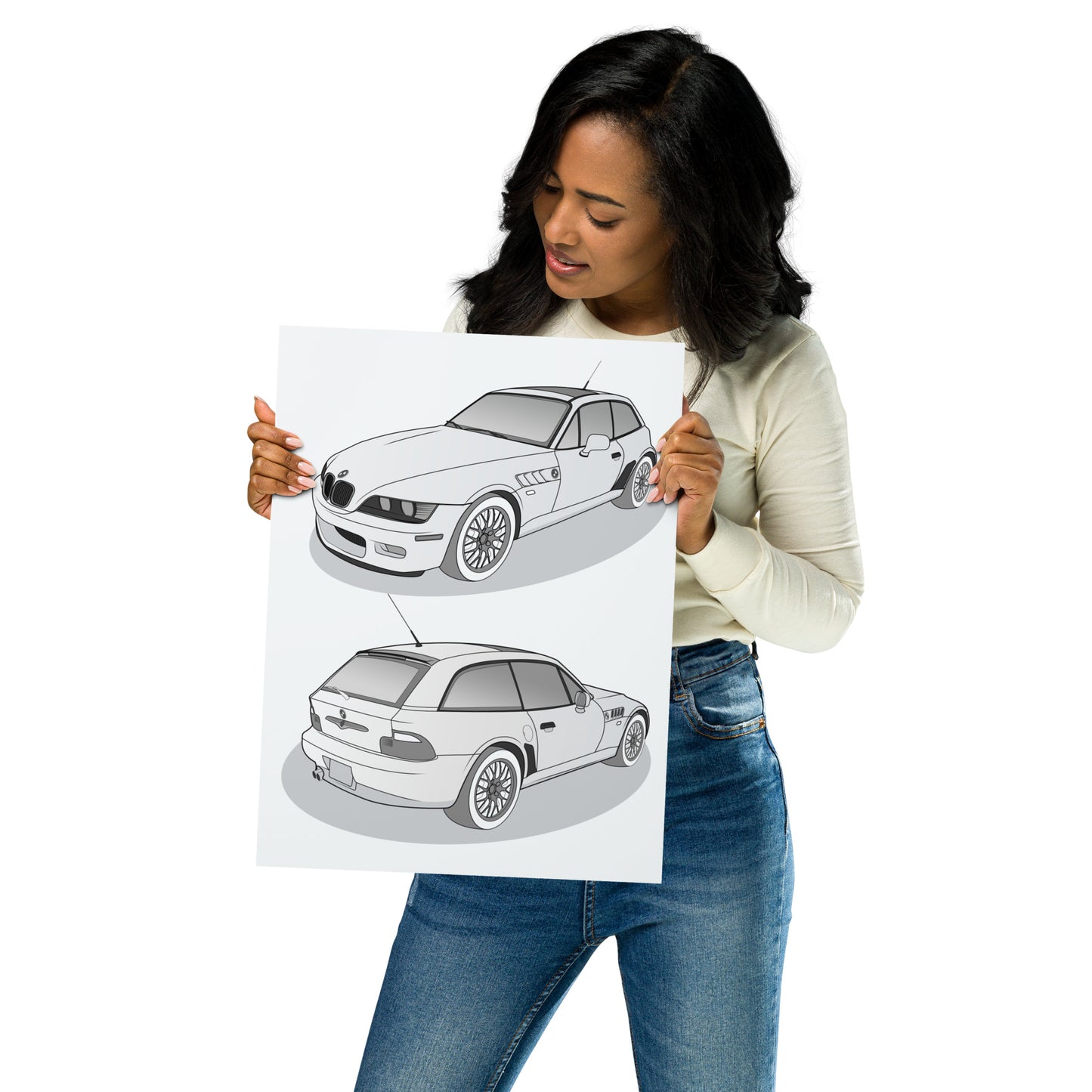 Person holding a 12x16 poster with two car illustrations