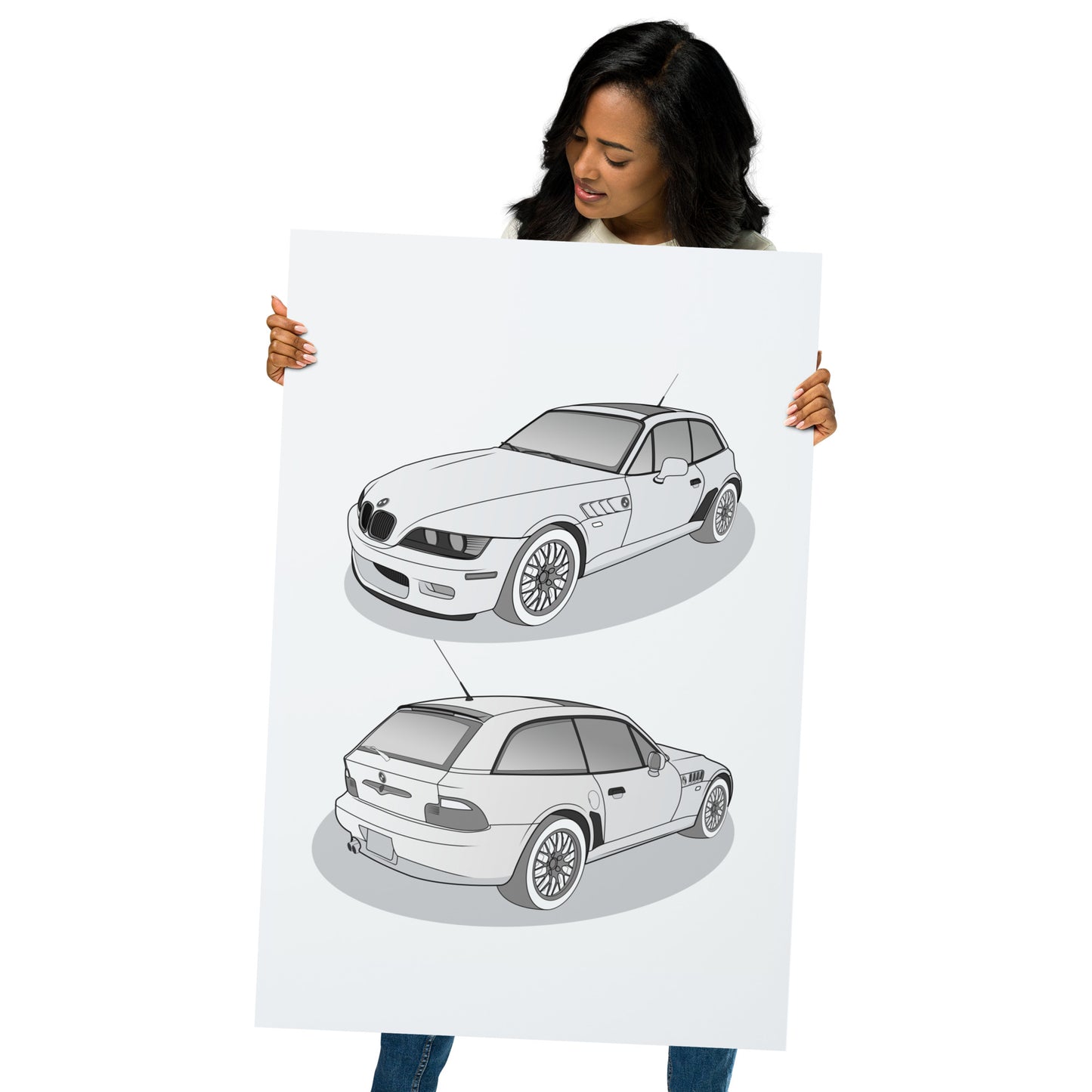 Person holding a 24x36 poster with two car illustrations