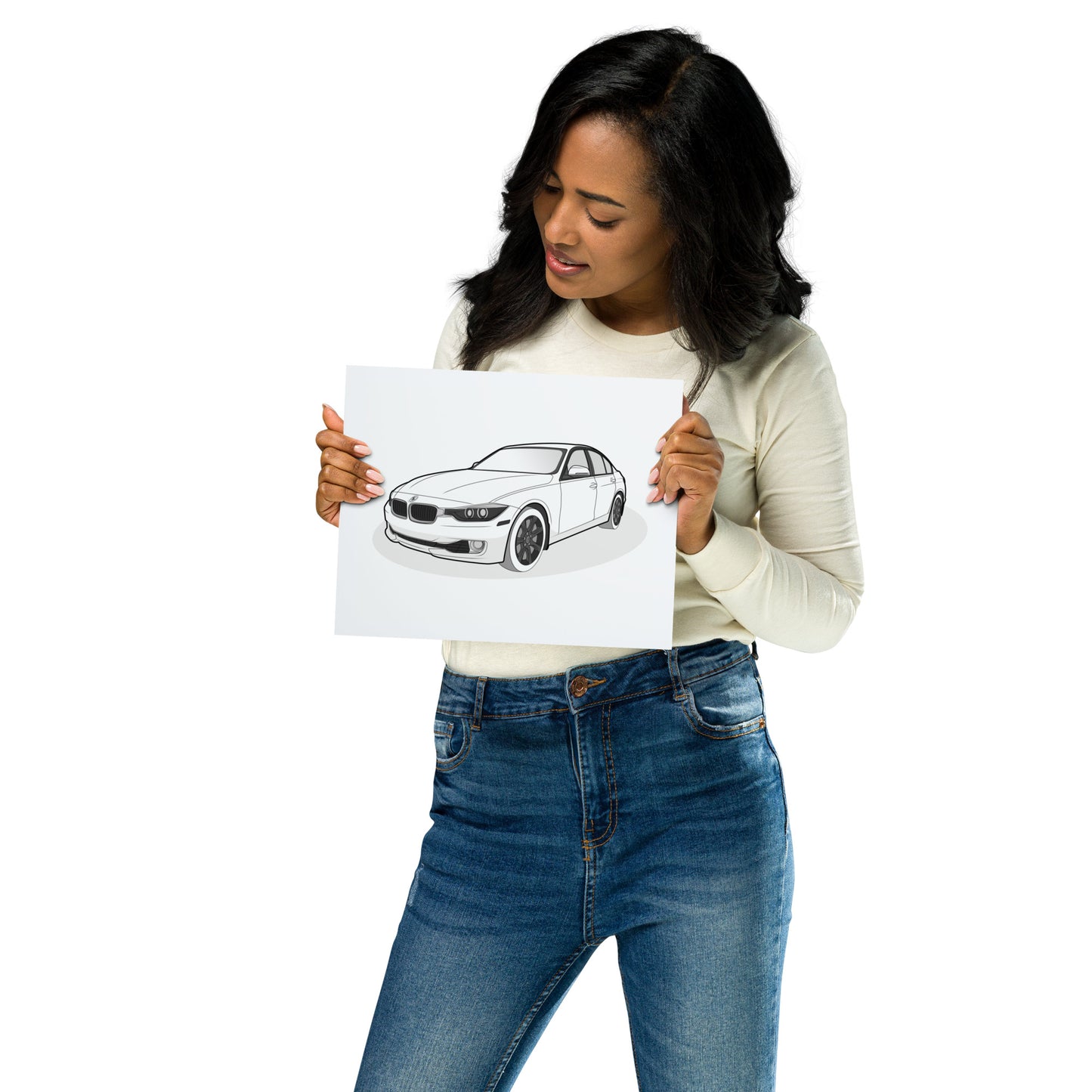 Woman holding a 8x10 print of a car drawing on a white background
